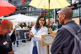 Female researchers present their projects to the public at Soapbox Science Event